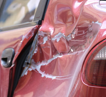 Image of a car dented after a car accident.