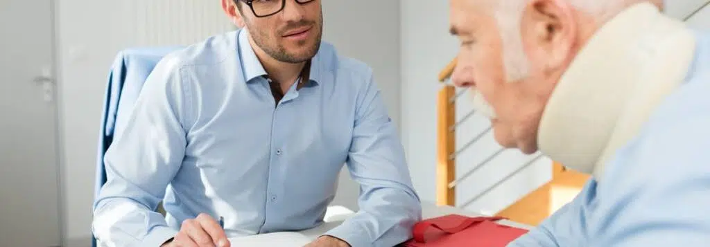 A personal injury lawyer meets with a client following a motor vehicle accident