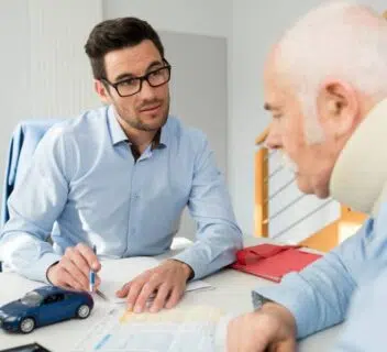 A personal injury lawyer meets with a client following a motor vehicle accident