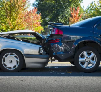 A rear end collision between two cars